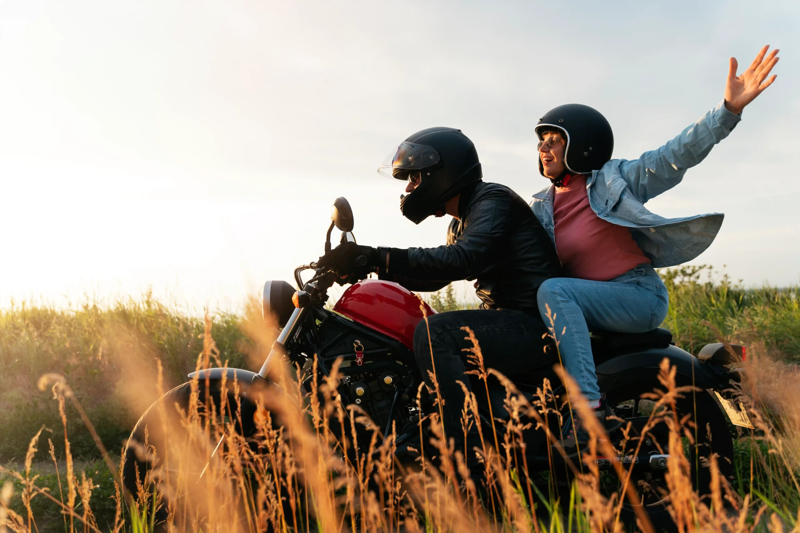 couple-riding-motorbike-around-beautiful-landscape