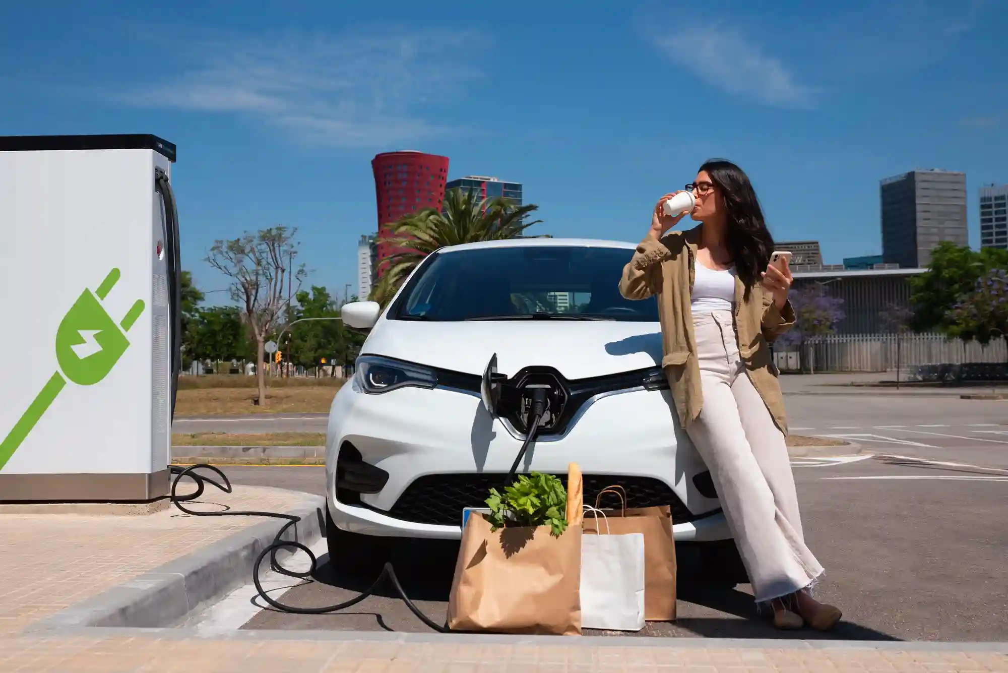 full-shot-woman-enjoying-coffee-near-car